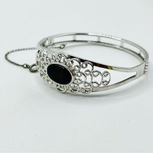 Sarah Coventry Silver tone filigree Bracelet with dark stone Accent